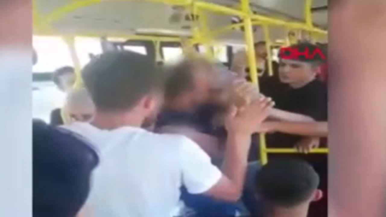 Otobüsteki adamın yolcuların fotoğraflarını çektiği iddia edildi tekme tokat dayak yedi