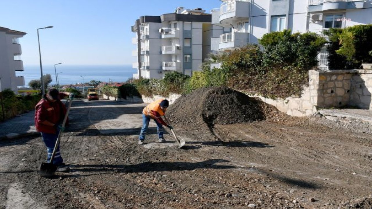 KUŞADASI’NDA SICAK ASFALT SEFERBERLİĞİ BAYRAKLIDEDE MAHALLESİ İLE SÜRÜYOR